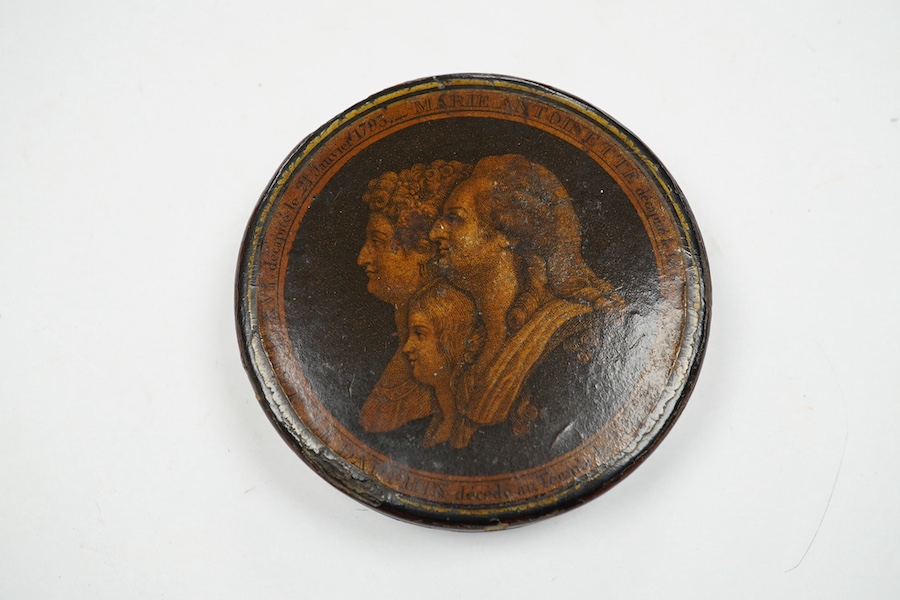 Death of Louis XVI and Marie Antoinette, a commemorative papier mache snuff box, 9cm diameter. Condition - some chipping and wear to edges, part of rim of cover missing